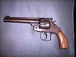 This is my recently acquired S&W Double Action .44, made Circa 1882-3. This is one of the first commercial examples of S&W's Double Action Trigger work. This revolver was originally Nickle-plated as y