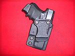 Kydex holster from Comp-Tac, the Infidel model.  Available in four different mounting options.
