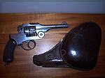 The Type 26 is a double-action only, break-open type revolver introduced in the 26th year reign of Emperor Meiji (1893). It was still in use in 1945. A little over 59,000 of these revolvers were produ