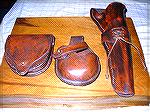 Hand man leather done by same guy. Leather was dyed to look old.