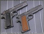 Comparing my son's Springfield GI45 with my Springfield Milspec. Outwardly you note the Milspec has a lowered ejection port, slanted slide serrations, and higher sights. It is also throated for modern