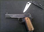 This is my sole 1911. It's a Rock Island chambered in 9MM. This has so little recoil it's a blast to shoot.
