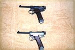 From Mike Wolf
Examples of WWII 8mm Nambus. One has a larger trigger guard for use with gloves. 