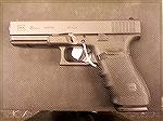 Glock 21 Gen 4. Has dual recoil spring, larger mag release, aggressive RTF style grip, and buildable backstraps.