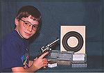 My son, many years ago, holding my Ruger Security-six that he used in a 4th Grade Science Fair project that involved the handloading of wadcutter bullets in .357 Magnum cases and shooting them against