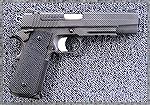 SIG 1911 (this is an early pre-TACOPS version)