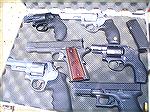 From top left then clockwise;
S&W 642, Taurus 94, S&W (new model) Bodyguard, Glock 22, S&W Mountain Gun, Springfield Armory Range Officer