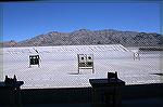 This is the municipal shooting park for Las Vegas, NV, located at the extreme north end of the valley with only mountains to the north of it.  This view is facing north from the covered shooting stati
