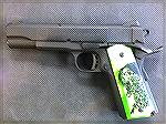 Rock Island Tactical 1911 chambered in 9MM with Hogue 1911 Zombie Grips.