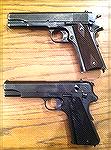 Colt Model 1911 possible Black Army Finish, along with Radom Vis 35 Grade 2 pistol with the takedown lever. 