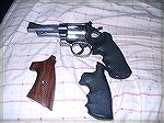 S&W 629 Mountian Gun in 44 Magnum sporting X frame Rubber grips by Hogue. Custom Wooden grips and Factory installed Rubber grips by Hogue.