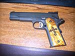 Springfield Range Officer with custom made grips from Hakan Grips. Made from Olivewood grown in Bethlehem.