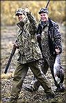 John Kerry looks perfectly natural in camo.
