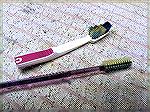 Once they've served their purpose in oral hygiene, toothbrushes are a good addition to the cleaning bench.  Use them as is, take a couple and cut the bristles down low to make them firmer for better c