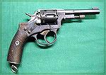 Swedish Model 1887 Nagant revolver, chambered in 7.5mm, about a .310 caliber.  The original cartridge was paper-patched lead bulleted.  The ammunition is very rare today as only 14000 rounds of ammuni