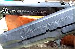The Rock Island Armory logos, old in front, new in back, on the slides of a couple of their GI line 1911s.  I like the new logo showing better the Island of Corregidor, "Rock Island" to Filipinos, wit