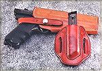 An ancient Safariland holster for a Ruger Standard Model along with a magazine pouch that I made for my son. The pouch isn't a perfect match, color-wise, but other than that I thought it turned out we