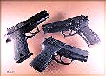 Terrible old scanned image, but it shows my three primary SIG pistols at a time when I was hot on the traditional double action, and believed that SIG, with their frame-mounted decocker and Stavenhage
