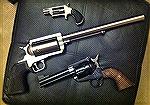 I wasn't exactly sure how to categorize this. They are Single Action Revolvers, but modern make.
NAA Wasp on Top chambered in .22 Magnum a FUN gun to shoot.
Magnum Research BFR chambered in .45-70 w