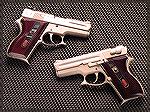 Two Charles Kelsey-built Devel pistols built from S&W M39s.  These were "successors" to the Paris Theordore-built Seventrees ASP pistol. and had improved features for the time.  Kelsey lightened the s
