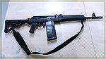 This Saiga-308 is a Parham Custom Guns conversion with a Side folding Stock and AR Buffer tube. The butt-stock is a Magpul CTR. I have 5 25 round magazines with it and a cheapie NcStar shoulder strap.