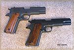 Rock Island GI Mid-size (Commander-size) .45ACP, top, Rock Island GI Full-size (Government-size) 9mm, bottom.  Both 100% reliable, fun to shoot pistols.  In real life both pistols are the same Parkeri