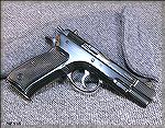 CZ 75 9mm pistol, built in 1987, no import mark, original 15 round magazines (current models use 16 round magazines).