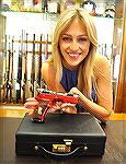 CZUB model Renata Langmanova with an engraved and anodized CZ P01 that was presented to her by CZ.