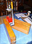 An old Lee Turret Press that I've used for over 35-years.  It is mounted on a hard maple box, which was designed to store the press when it was not in use.  I've loaded LOTS of ammunition on this pres