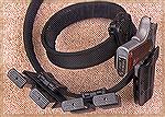 This BladeTech rig includes a polymer holster angled slightly away from the body and two double magazine pouches (also polymer) mounted on a nylon web belt system. An inner belt has Velcro on the outs