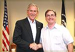 Engraver Brian Powley of Ohio presents President Bush with "The President George W. Bush Commemorative Pistol."  This pistol was worked on by various folks, see adjacent images of the pistol.