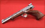 This beautiful pistol is a Browning Medalist in Renaissance grade.