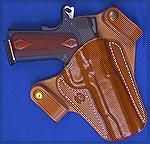 The Milt Sparks Nexus holster in natural finish assembled with the leather's rough side in. This is the first Sparks holster to use self-closing, neodymium magnetic closures on its belt loop system an