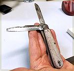 Here is an old pocket knife a friend of mine got as part of an auction.  It's quite rusty but not terribly worn.  It seems a user tried to make a screwdriver of what was a second knife blade.  The mak
