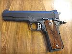 My old Colt 1911. It was a Navy Model from 1912/13, but it was refurbed with a new finish and slide prior to or during WWII.