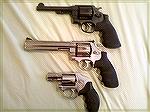 Top to Bottom: 
Smith & Wesson 1917 .45 ACP
Smith & Wesson 610  10MM
Smith & Wesson 940  9MM