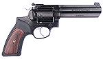 Ruger GP100 in .44 Special.  Note the original style rubber grips with wood inserts, the unfluted cylinder, the deep blue-black finish.
