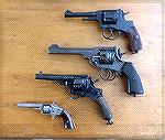 Just recently lined up some of my older revolvers.From newest to oldest:
1895 Nagant Single Action. Chambered in 7.62 Nagant. Manufactured at Tula Arsenal in 1937.
Webley MKVI made in 1916. Cylinder