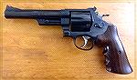 What we have here is a Model 25-5 chambered in .45 Colt. The grips are aftermarket and taken from the 1917 S&W Snubby. The bigger grips help handle the balance of that longer barrel. 