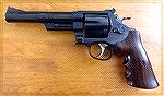 What we have here is a Model 25-5 chambered in .45 Colt. The grips are aftermarket and taken from the 1917 S&W Snubby. The bigger grips help handle the balance of that longer barrel. 