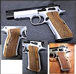 After finding EAA out of stock for a long time, yet finding nothing elsewhere, I stumbled across these walnut Tanfoglio stocks on EAA's web site.  Mostly stippled, but smooth just along the back only,