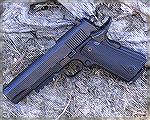 Tanfoglio-produced Witness 1911P.  In shape and size this is exactly a 1911, save of course for the addition lf a rail molded in below the dust cover.  While this isn't my photo, I've owned one for a 