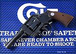 Colt Official Police with 4" barrel, caliber .38 Special.  Made in 1943.