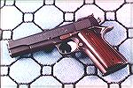 An older Series 70 in 9mm I purchased and converted to .38 Super.  Sadly this pistol, previously customized as you see it here, never was completely reliable as .38 Super OR 9mm, and is one of only th