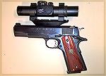 My Bullseye 1911 with Red Dot scope mounted on the frame and not the slide