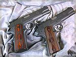 My two Springfield Range Officer pistols, .45ACP and 9mm.  These are the original, Parkerized, five inch models with LPA sights, not any of the later models made after the originals sold like crazy an