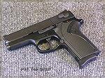 This is my Smith & Wesson Model 3914, the blued version of the vastly more common and more popular 3913, which has a stainless slide and silver anodized frame.  Mine is really in very good condition, 