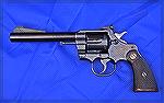 I split the original 7.5" barrel on this Colt Officer's Model and had a 6" bull barrel installed in its place. This required new front and rear sights but the gunsmith did such a good job it now shoot