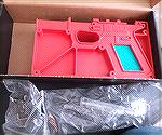 Here is the Polymer 80 kit directly out.of the box. The frame is in a red template that has holes on where to drill and where to mill. It also comes with all necessary parts for the frame which then t