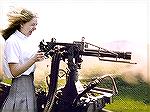 Woman enjoying shooting a machinegun